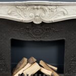 Antique White Fireplace with Inset.