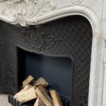 Antique White Fireplace with Inset.